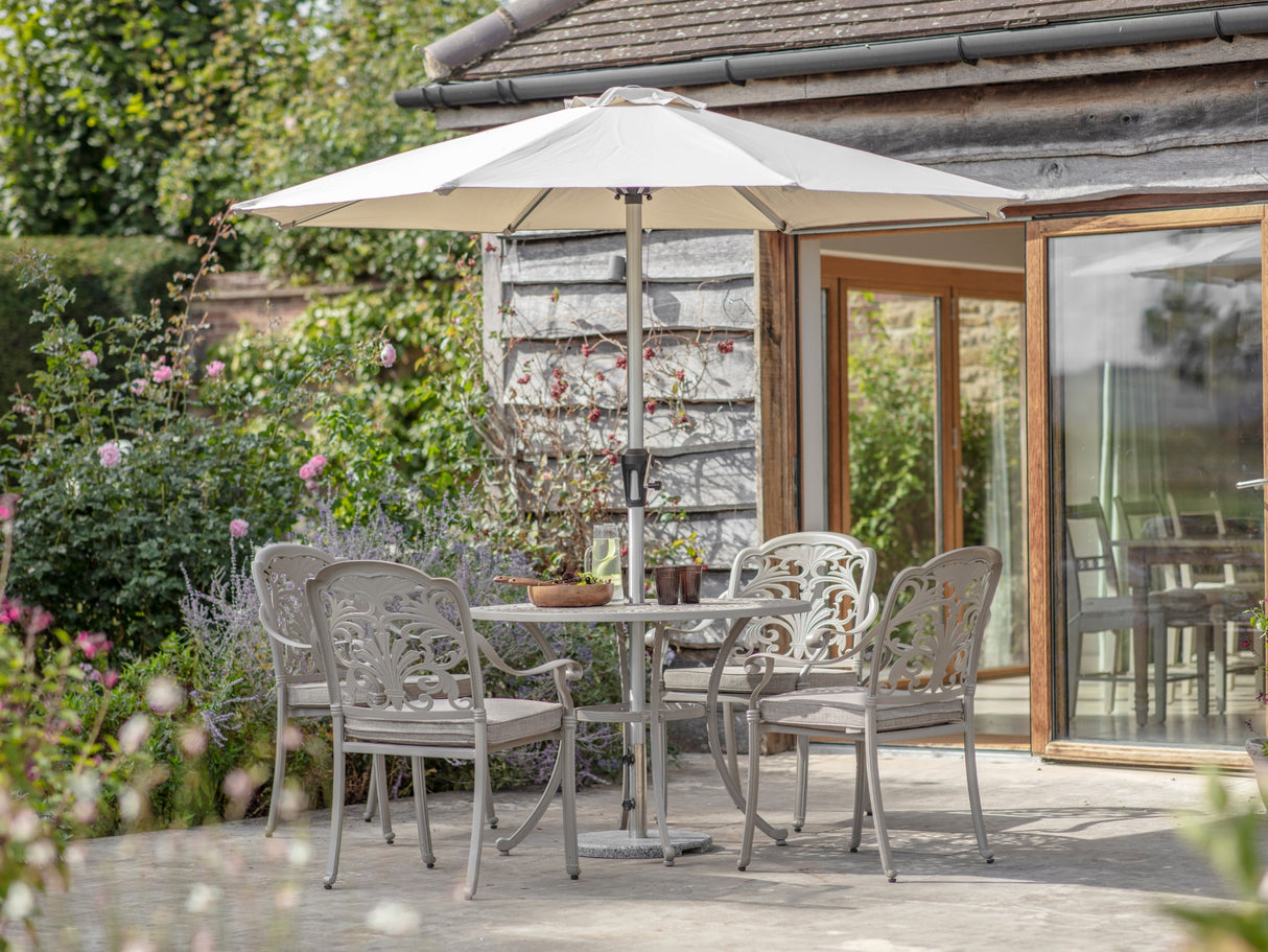 Bramblecrest Venice 4 Seat Round Dining Set with Parasol & Base – Stone