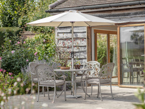 Bramblecrest Venice 4 Seat Round Dining Set with Parasol & Base – Stone